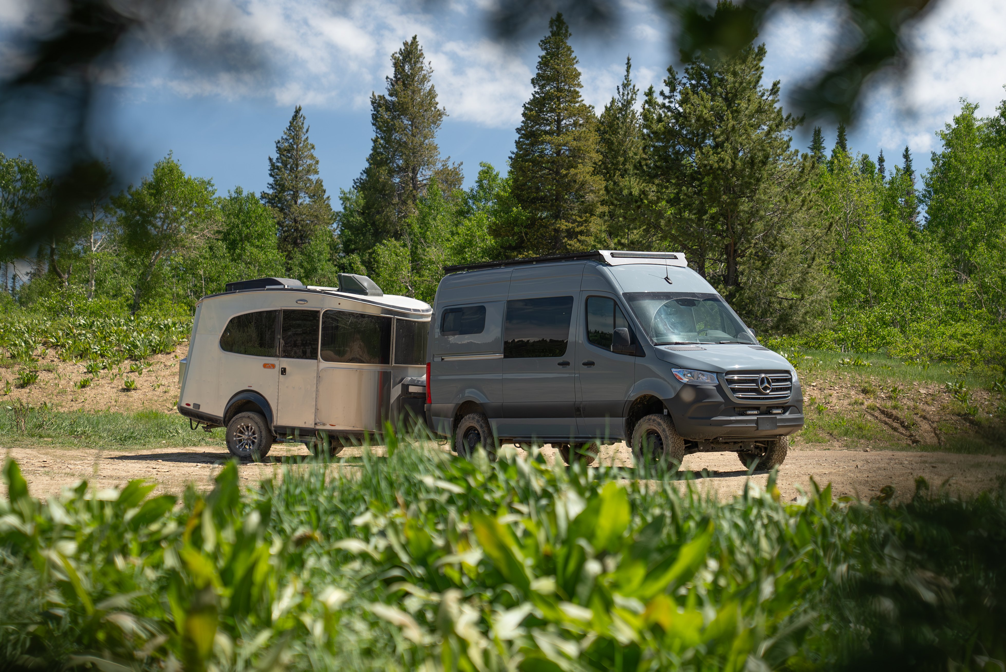 2026 Off Highway Van Doc Holliday 144 Offroad Off-Grid Mercedes Sprinter Camper Van Towing an Airstream Trailer (2)